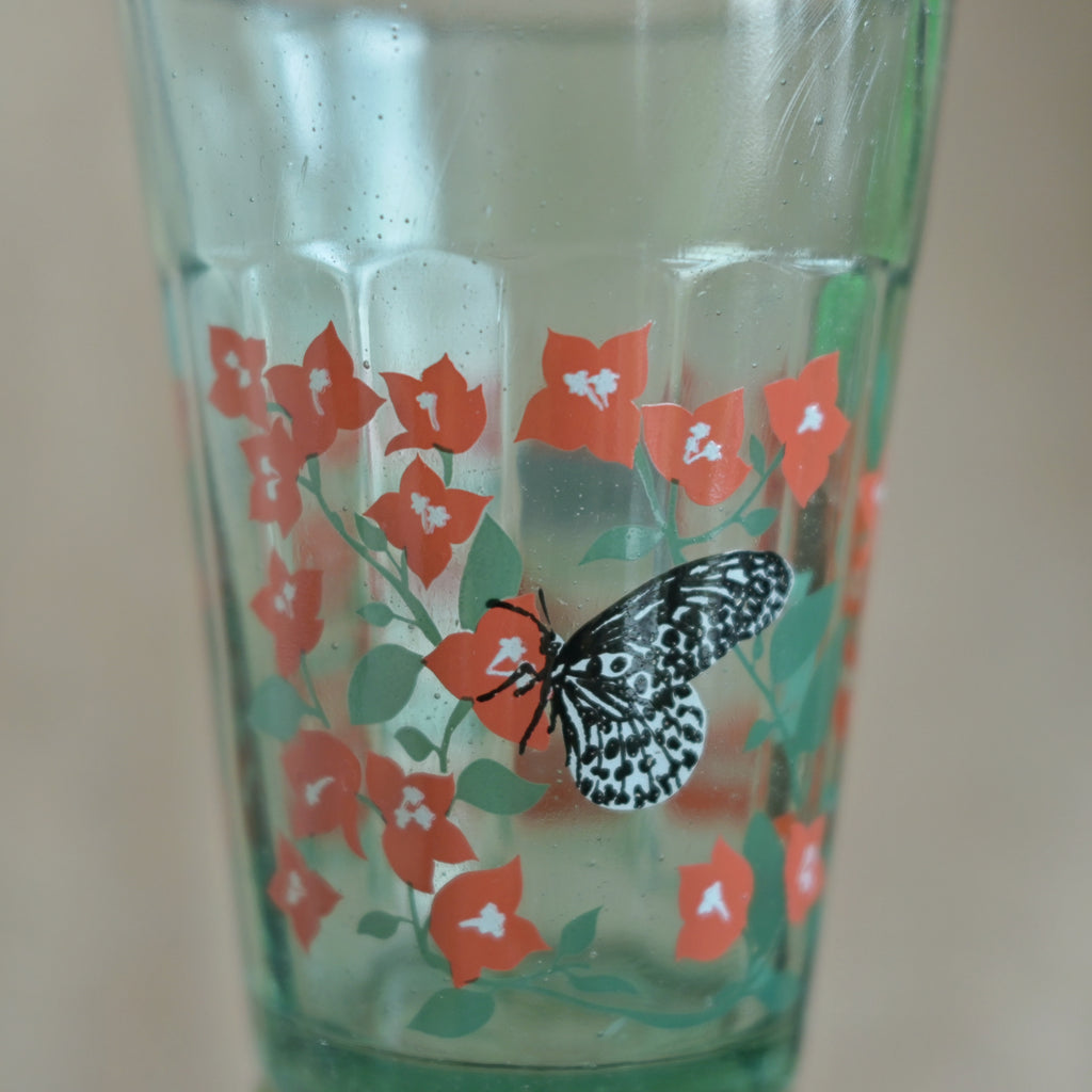 Bougainvillea blooms kissing butterflies