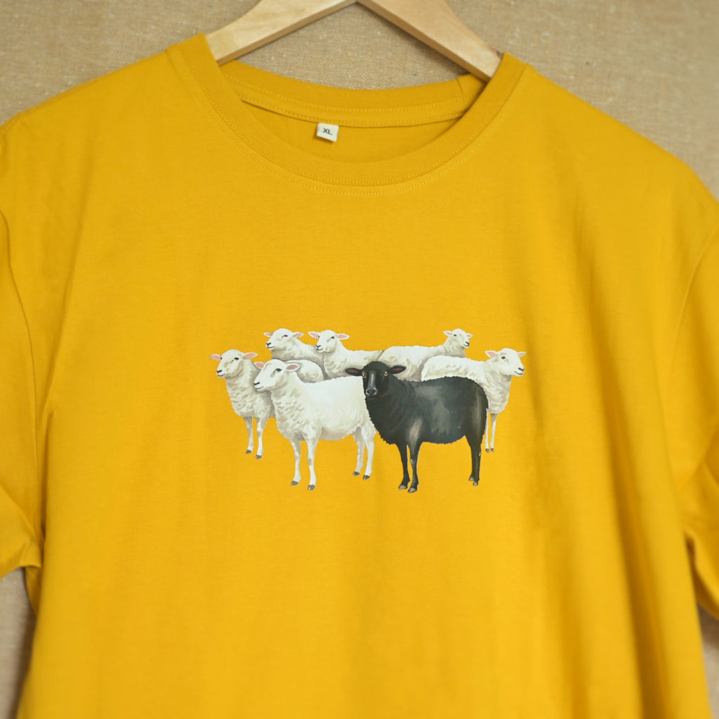 The black sheep stands tall