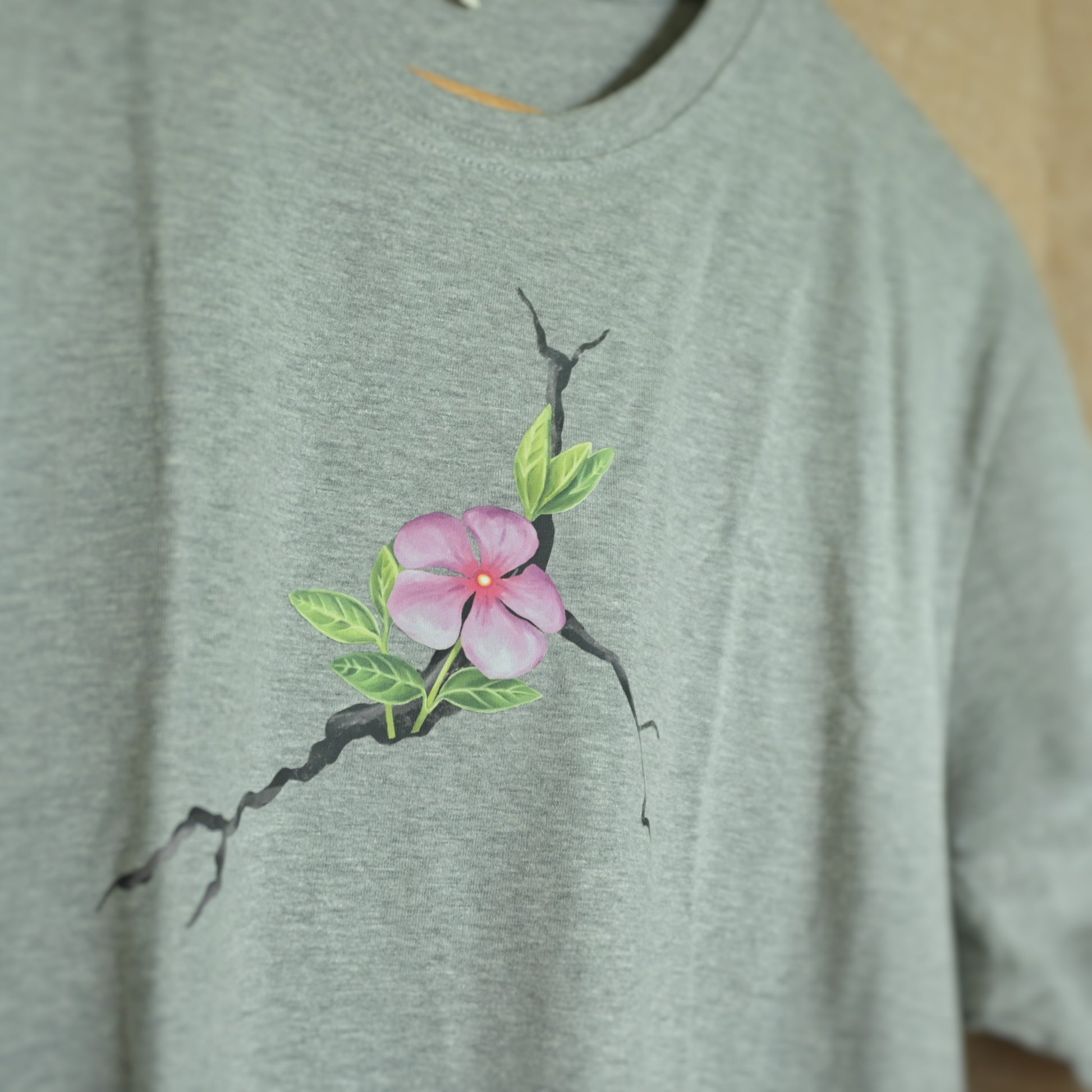 Periwinkle blooms through the hurt 002